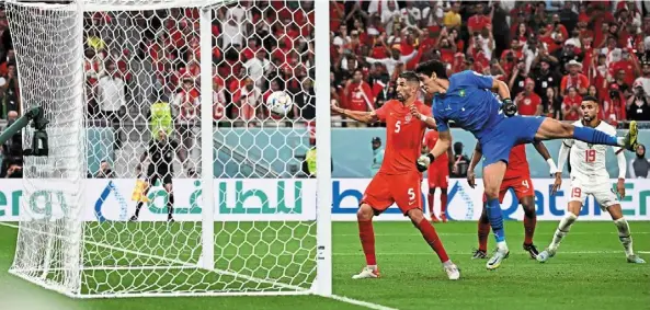  ?? — AFP/AP ?? It’s too fast: canada’s Steven Vitoria (right) and goalkeeper dayne St clair watch the ball during the Group F match against morocco at the al-thumama Stadium. Below: belgium’s Thorgan Hazard (left) vying for the ball with croatia’s ivan Perisic.