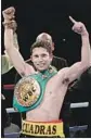  ?? Jiji Press AFP/Getty Images ?? CARLOS CUADRAS held the WBC super f lyweight title for two years and wants it back.