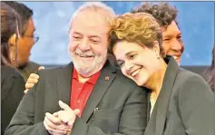  ??  ?? File photo shows Lula (left) and Rousseff attending the Workers Party (PT) National Congress to elect its new president, in Brasilia. — AFP photo