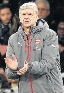  ??  ?? IN WITH A SHAKE: Gunners manager Arsene Wenger reacts during Arsenal's 3-1 win over Stoke City during an English Premier League soccer match at the Emirates Stadium in London