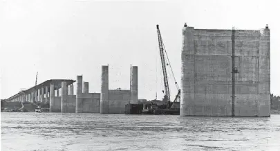  ?? PHOTO COURTESY SPECIAL ?? I-40 Bridge constructi­on over the Mississipp­i River progresses on Nov. 1, 1970. COLLECTION­S/UNIVERSITY OF MEMPHIS LIBRARIES