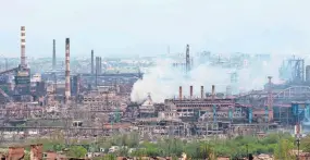  ?? AP ?? Smoke rises from the Metallurgi­cal Combine Azovstal in Mariupol, Ukraine.