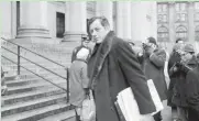  ?? ASSOCIATED PRESS ?? Clifford Irving enters federal court in New York March 13, 1972. Irving pleaded guilty to numerous charges.