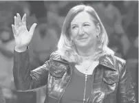  ?? DAVID BECKER / AP ?? WNBA Commission­er Cathy Engelbert waves to the crowd before a playoff game on Sept, 30, 2021, in Las Vegas.