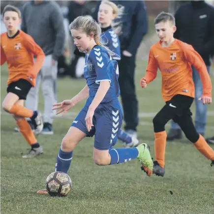  ??  ?? Durham RTC Under-11s (blue) taking on Deerness Valley Thunder (orange).