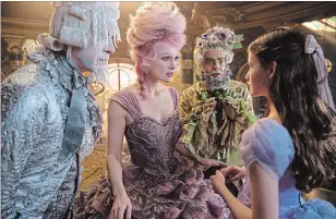  ??  ?? Richard E. Grant, Keira Knightley, Eugenio Derbez and Mackenzie Foy in a scene from "The Nutcracker and the Four Realms."