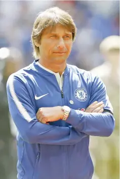  ?? — AFP photo ?? Chelsea’s Italian head coach Antonio Conte looks on before the English FA Community Shield football match between Arsenal and Chelsea at Wembley Stadium in north London on August 6, 2017.