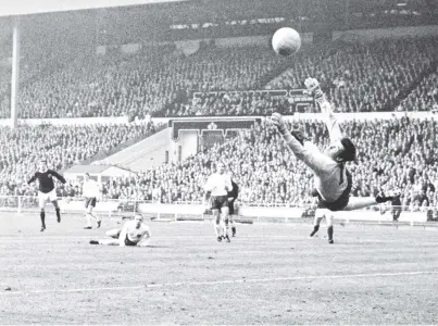  ?? PHOTOS: GETTY IMAGES ?? Safe pair of hands . . . Gordon Banks saves a shot from Denis Law during an EnglandSco­tland clash at Wembley in 1967.