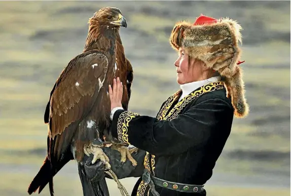  ??  ?? Thirteen-year-old Mongolian Aisholpan is the star of The Eagle Huntress.