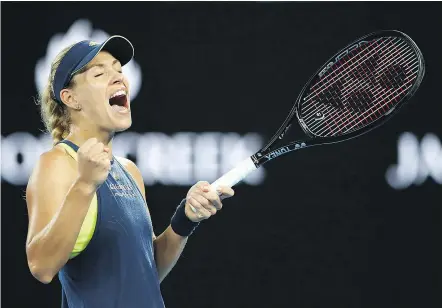  ?? — GETTY IMAGES ?? Germany’s Angelique Kerber celebrates the winning match point in her third-round rout of Russia’s Maria Sharapova at the Australian Open Saturday night in Melbourne.