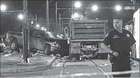  ??  ?? A vehicle is seen crashed along the Endymion parade route. (Photo: reuters)