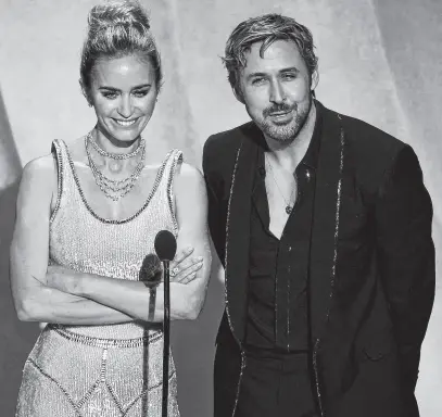  ?? REUTERS ?? Ryan Gosling and Emily Blunt present March 10 during the Oscars show at the 96th Academy Awards in Hollywood.