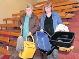  ??  ?? Effort Anne Turner and Linda White were on clean up duty before the repairs