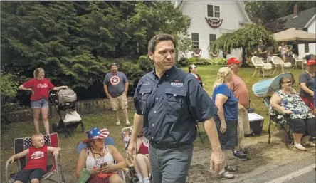  ?? John Tully For the Washington Post ?? FLORIDA Gov. Ron DeSantis, shown at a Fourth of July parade in New Hampshire, appointed non-historians to a Black history panel.