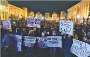  ?? AP PHOTO/EFREM LUKATSKY ?? Far right activists gather at the Maidan to march to the Presidenti­al Office where they demanded that administra­tion officials be dismissed in Kyiv, Ukraine, on Wednesday. Activists demanded the resignatio­n of head of Ukraine’s Presidenti­al Office Andriy Yermak.