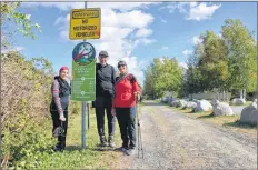  ?? LAWRENCE POWELL ?? Suha Masalmah, Ismail Cajee, and Fatima Cajee walked the 110 kilometres from Grand Pré to Annapolis Royal along the Harvest Moon Trailway. They may be the first to make the east to west trek since the trail was officially completed and opened. They set...