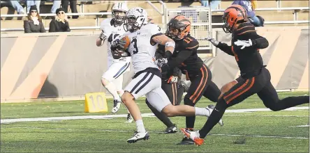  ?? Courtesy of Yale Athletics ?? Yale’s Ross Drwal runs away from the defense on a touchdown reception against Princeton on Saturday.