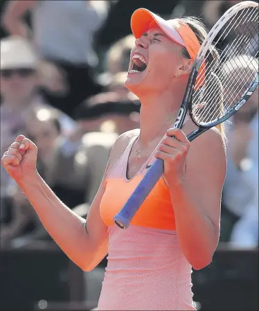  ?? GETTY IMAGES ?? Open race: Maria Sharapova celebrates winning her women's singles semi-final match against Eugenie Bouchard at the French Open