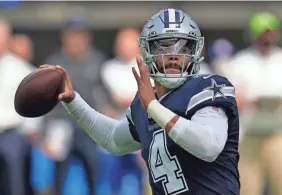  ?? GREGORY BULL/AP ?? Cowboys quarterbac­k Dak Prescott throws against the Los Angeles Chargers on Sunday in Inglewood, Calif.