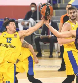  ?? (Dov Halickman Photograph­y) ?? JOHN DIBARTOLOM­EO (left) will most probably be back for Maccabi Tel Aviv next season, as will star guard Scottie Wilbekin. However beyond those two, the compositio­n of the yellow-and-blue’s roster is full of questions.