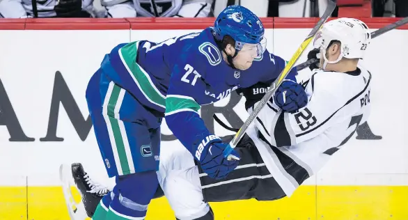  ?? THE CANADIAN PRESS ?? Ben Hutton, left, was scratched Saturday for the ninth time in the last 25 games. There’s little interest being shown in the 24-year-old as the trade deadline nears.