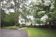  ?? Alexander Soule / Hearst Connecticu­t Media ?? A Lockwood Road home in Greenwich sold in May for $1.98 million, $20,000 below the price of the town’s median home sale over the first five months of 2021.
