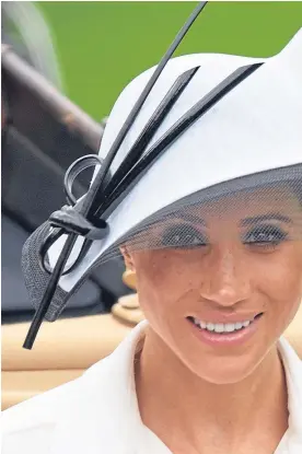  ??  ?? Right: Meghan, Duchess of Sussex, and Prince Harry, Duke of Sussex, attend day one of Royal Ascot.