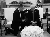  ?? ASSOCIATED PRESS ?? PRESIDENT DONALD TRUMP prays with American pastor Andrew Brunson in the Oval Office of the White House Saturday in Washington. Brunson returned to the U.S. after he was freed Friday, after nearly two years of detention in Turkey.
