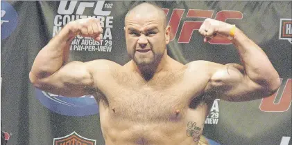  ?? CP PHOTO ?? Tim Hague poses at a weigh-in Portland, Ore. in this 2009 file photo.