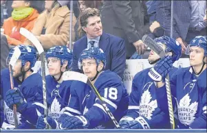  ?? CP PHOTO ?? Toronto Maple Leafs head coach Mike Babcock looks on during the final seconds of Monday’s game against the Calgary Flames in Toronto.