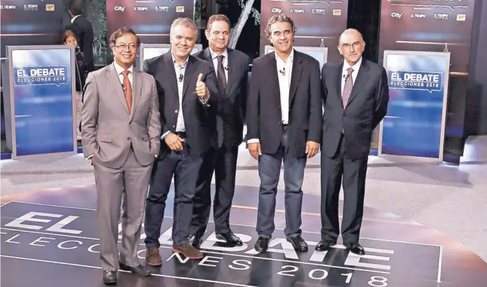  ??  ?? ► Los candidatos Gustavo Petro, Iván Duque, Germán Vargas Lleras, Sergio Fajardo y Humberto de la Calle, en el debate del jueves en Bogotá.