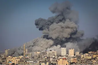  ?? ?? File photo shows smoke billowing during Israeli air strikes in Gaza City as raging battles between Israel and the Hamas movement continue.