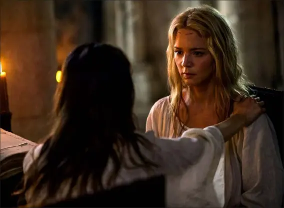  ?? AP Photos ?? daphne Patakia, left, and Virginie efira are seen in a scene from ‘benedetta,’ also below.