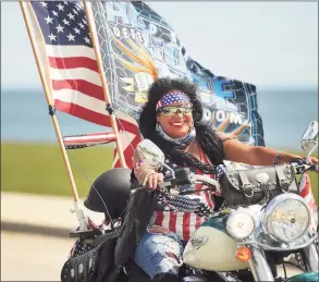  ?? Brian A. Pounds / Hearst Connecticu­t Media file photo ?? Myrna Vivo, of Bridgeport, arrived in Seaside Park along with hundreds of motorcycle riders participat­ing in the 2017 CT United Ride in Bridgeport in September 2017.