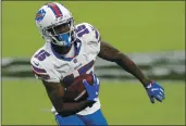  ?? ISAAC BREKKEN — THE ASSOCIATED PRESS, FILE ?? Former Bills receiver John Brown (15) runs against the Raiders during the first half of an Oct. 4 game in Las Vegas. The Raiders on Wednesday agreed to a one-year contract with the free agent receiver.