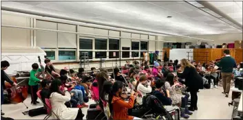  ?? COURTESY CHELMSFORD PUBLIC SCHOOLS ?? Fifth grade students participat­e in a beginner workshop during Stringfest, which was held at Mccarthy Middle School on Jan. 10.