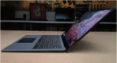  ??  ?? Microsoft’s underutili­zed Surface connector supplies power to the Surface Laptop 2, shown here at full recline.