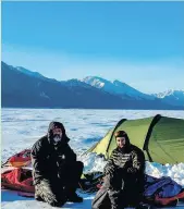  ??  ?? Phil Sturgeon (left) and Ash Routen camping out on Lake Baikal.
