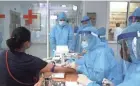  ?? HAU DINH/AP ?? A health worker draws blood for a COVID-19 test in Hanoi, Vietnam, on Friday, where cases are surging again.