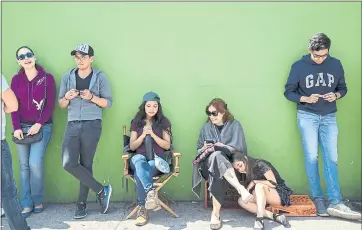  ?? ANTHONY VAZQUEZ — ASSOCIATED PRESS ?? Voters wait in line outside a polling station during general elections in Mexico City.