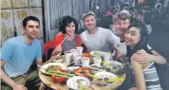  ??  ?? The Ballet West team enjoying street food in Penang. Left to right are Jonathan and Gillian Barton, Martin Fenton, Oscar Ward and Uyu Hiromoto.