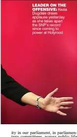  ??  ?? LEADER ON THE OFFENSIVE: Kezia Dugdale draws applause yesterday as she takes apart the SNP’s record since coming to power at Holyrood
