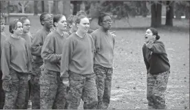  ?? Scott Olson/getty Images/tns, File ?? A drill instructor shouts instructio­ns at her Marine recruits during training in boot camp in 2013 at MCRD Parris Island, South Carolina.