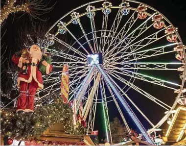  ?? Foto: G. Jallay / LW-Archiv ?? Das Riesenrad wird auch in diesem Jahr auf der Place de la Constituti­on errichtet.