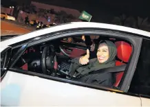  ?? PHOTO: REUTERS ?? In control . . . A Saudi woman behind the wheel of her car in Al Khobar, Saudi Arabia on June 24, the day women were finally given permission to drive in the kingdom.