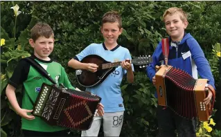  ?? Photo by Domnick Walsh ?? Kilcummin talents Michael Healy, Ewan Evans and Liam Kerrisk rocking it at the weekend in Listowel.