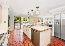  ?? ?? “The feel of the home is charming, yet of the moment,” said listing agent Tom Vozzella.