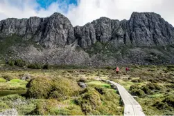  ??  ?? Above: An opportunit­y to experience Tasmania’s highlands and wild camping.