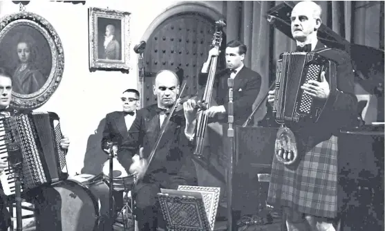  ??  ?? A reader has sent in this picture of accordioni­st Jimmy Shand with his band, but unfortunat­ely, we have no idea about the occasion of the date. Anyone have any suggestion­s?
