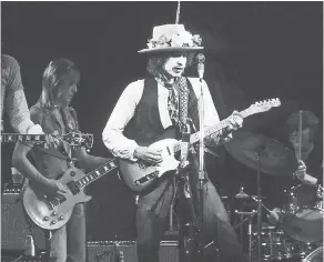  ??  ?? Bob Dylan performing in the 1970s NETFLIX